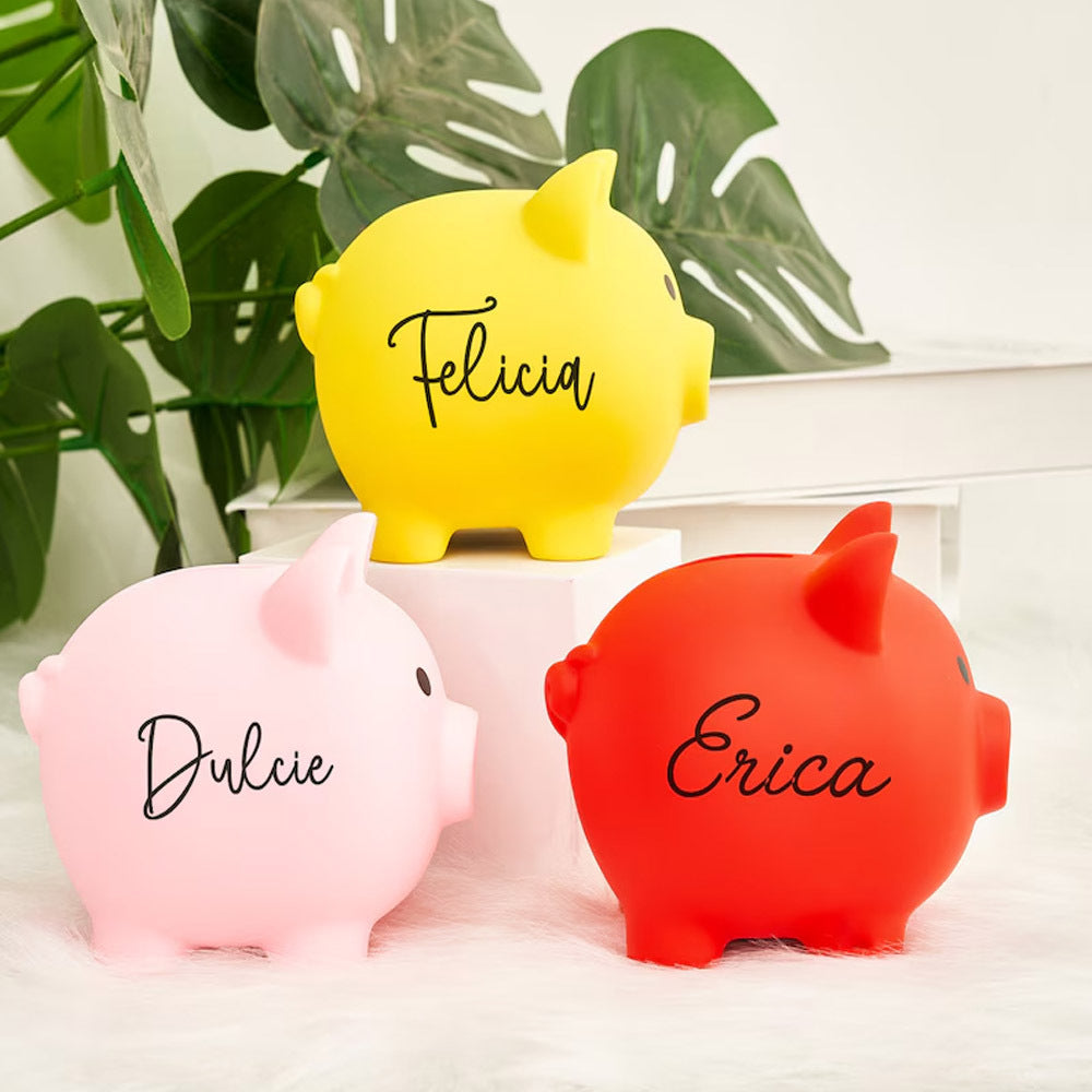 Tirelire cochon en 4 coloris, bouchon amovible