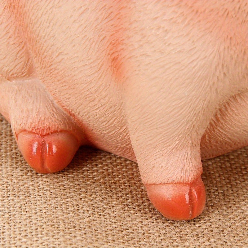 Tirelire cochon assis au poil gravé, gueule grande ouverte