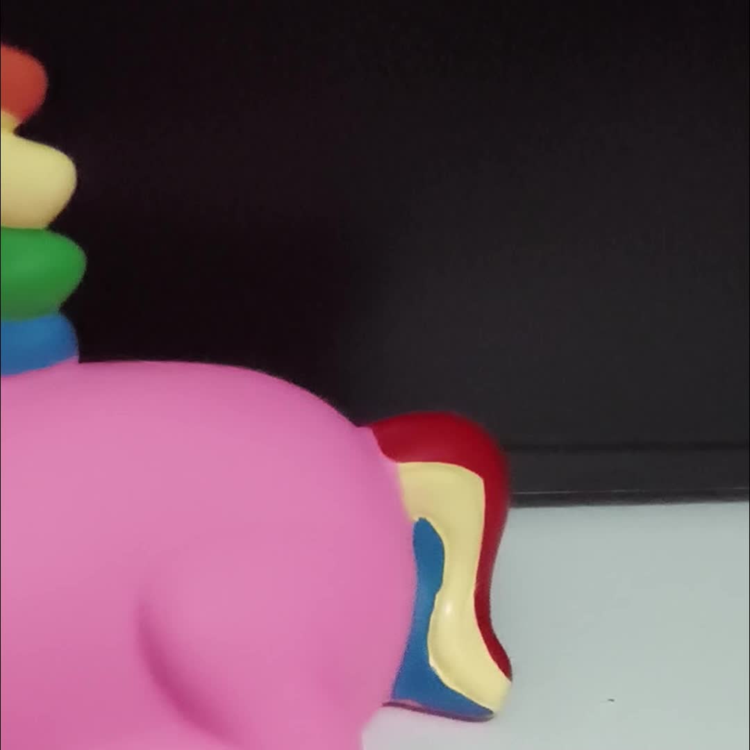 Tirelire licorne arc-en-ciel — Bouchon rotatif sous la base