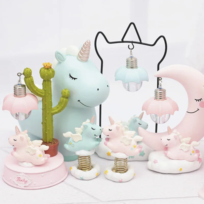 Tirelire licorne en résine, ailes et étoiles peintes