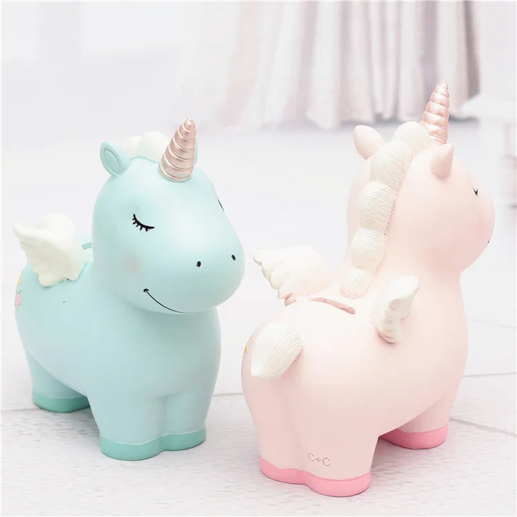Tirelire licorne en résine, ailes et étoiles peintes