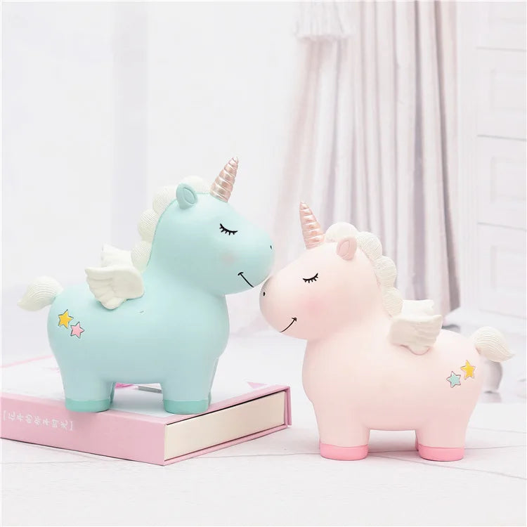 Tirelire licorne en résine, ailes et étoiles peintes